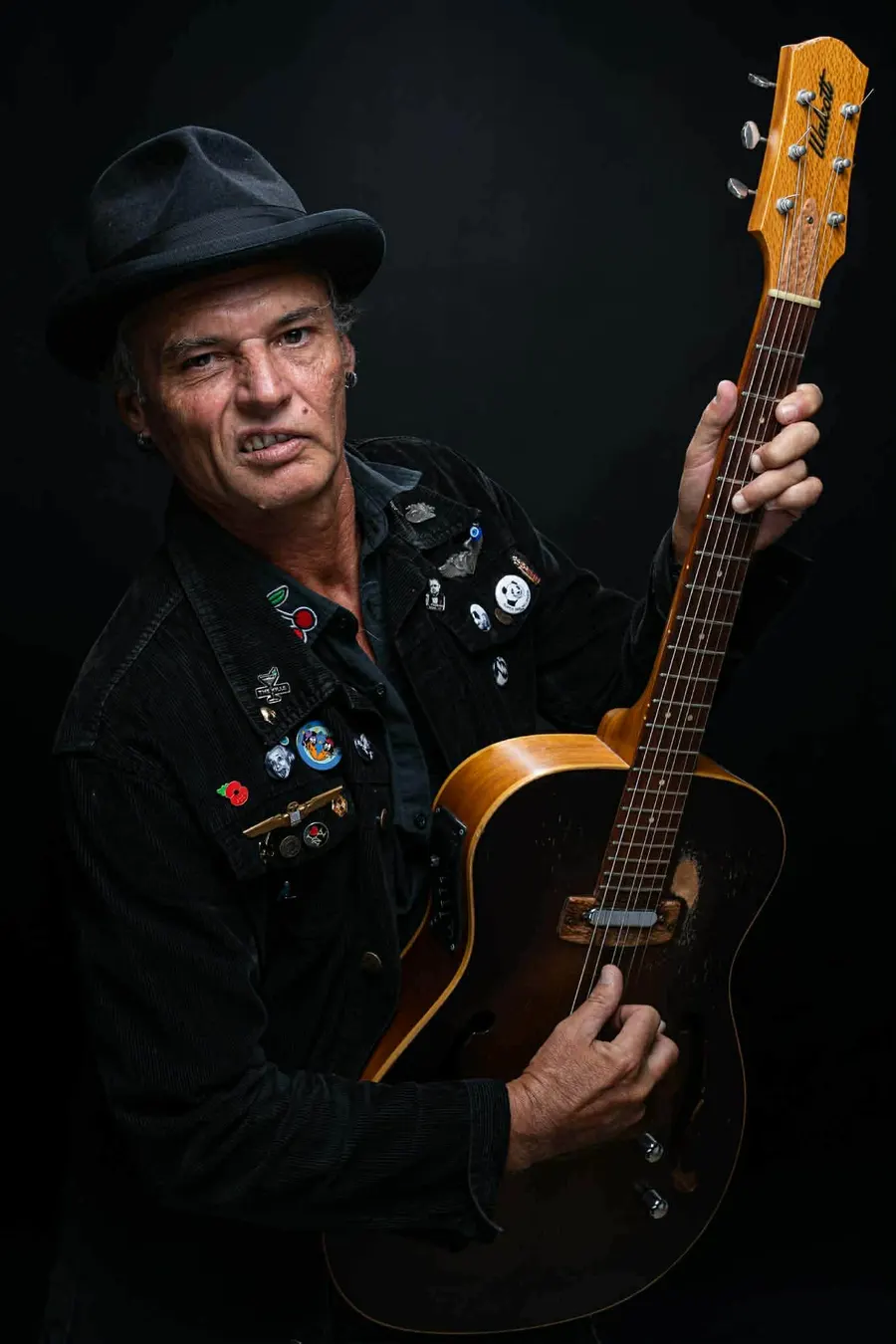Gavin Doniger portrait with archtop guitar