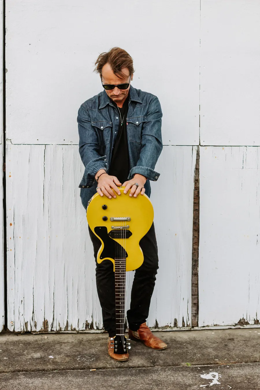 Gavin Doniger with yellow Les Paul Junior guitar